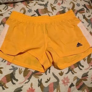 Women’s size small athletic shorts and shirt